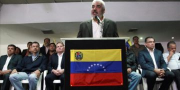 Angel Oropeza  member of the Venezuelan coalition of opposition parties  MUD   talks to the media during a news conference in Ca